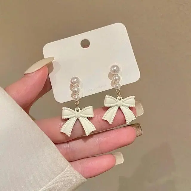 pearl bow drop earring
