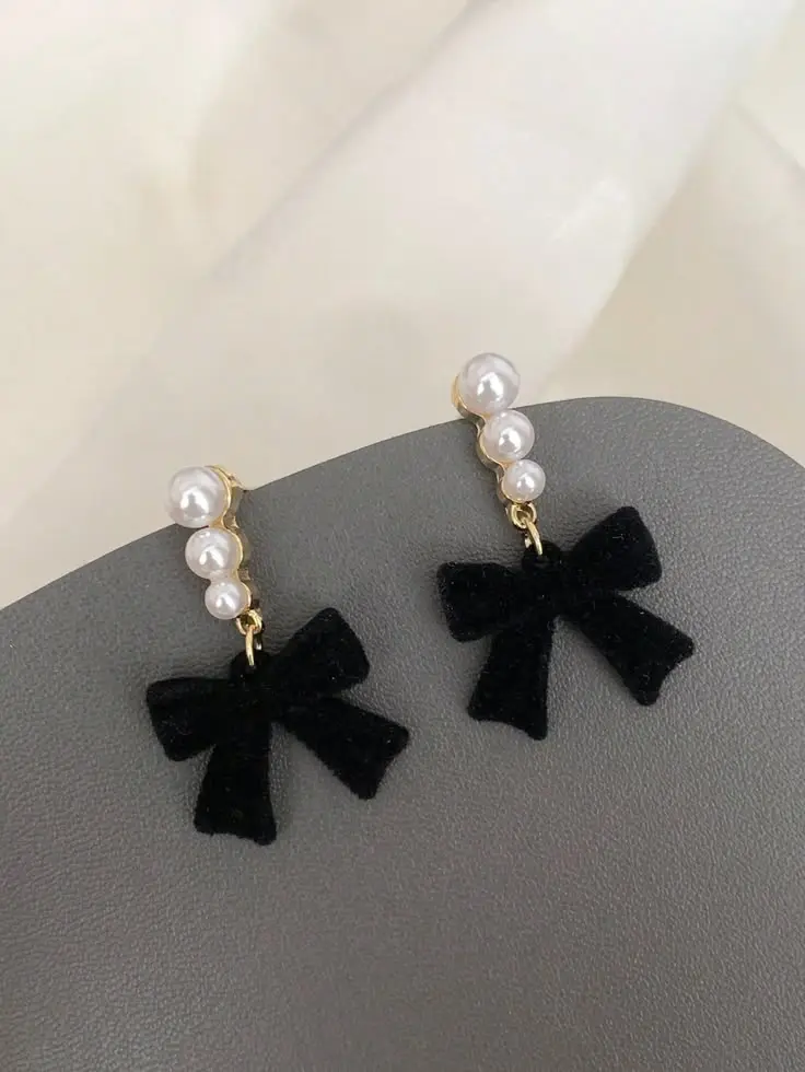 pearl black bow drop earring