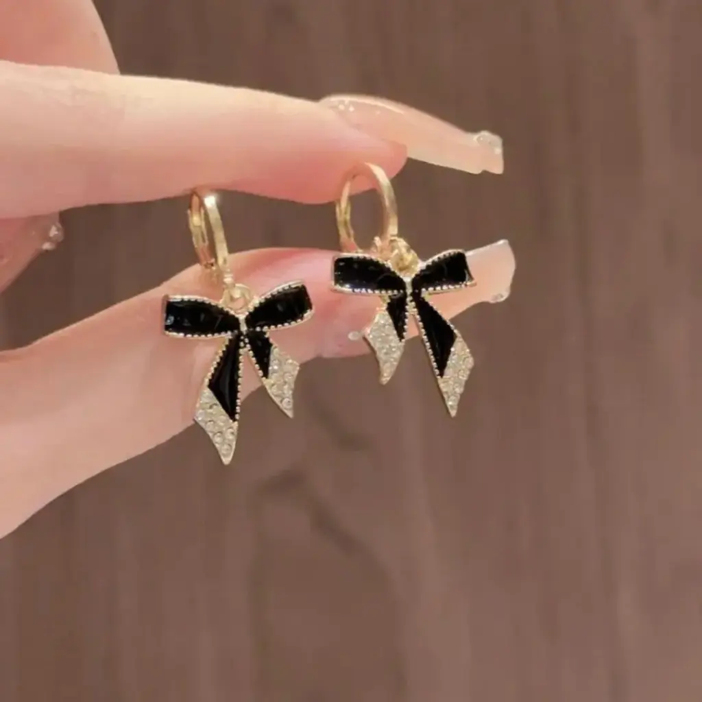 black bow earring