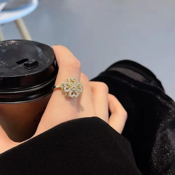 rotating cubic god plated clover ring